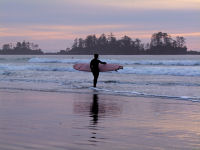 FREE wallpaper-Sunrises-Sunsets-61-Sets-Surfer-at-Chesterman-Beach-Tofino-B.C.-2009-01-14-FS