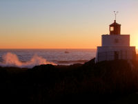 FREE wallpaper-Sunrises-Sunsets-85-Sets-at-Amphitrite-Lighthouse-UCLUELET-B.C.-2009-01-19-FS